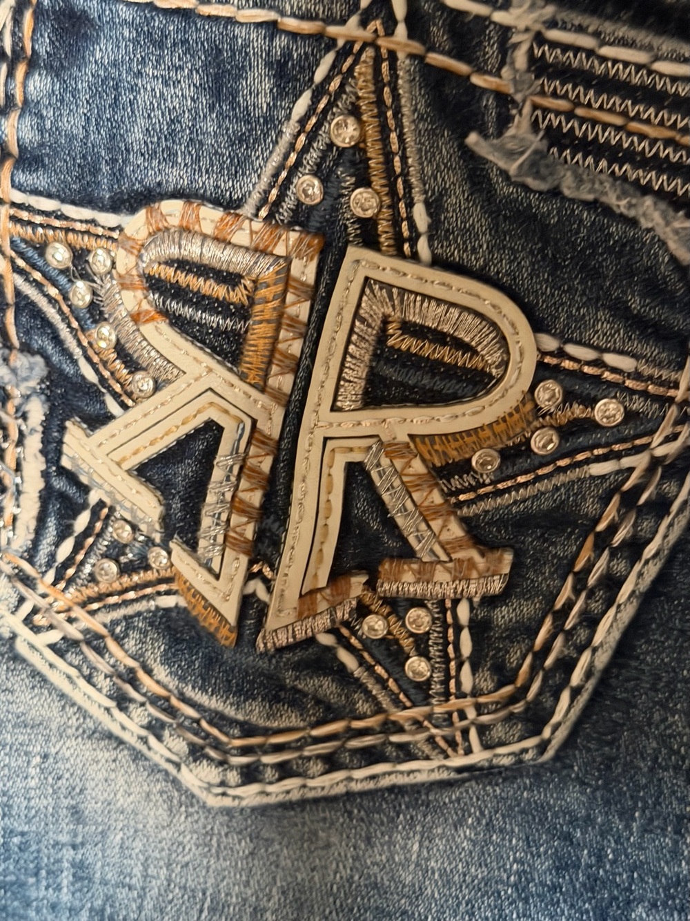Rock Revival Distressed Blue Jeans with Embellished AR Pocket